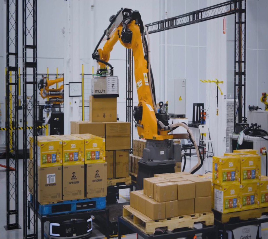 Robotic depalletizing system integrated with warehouse pallet handling by MESH Automation